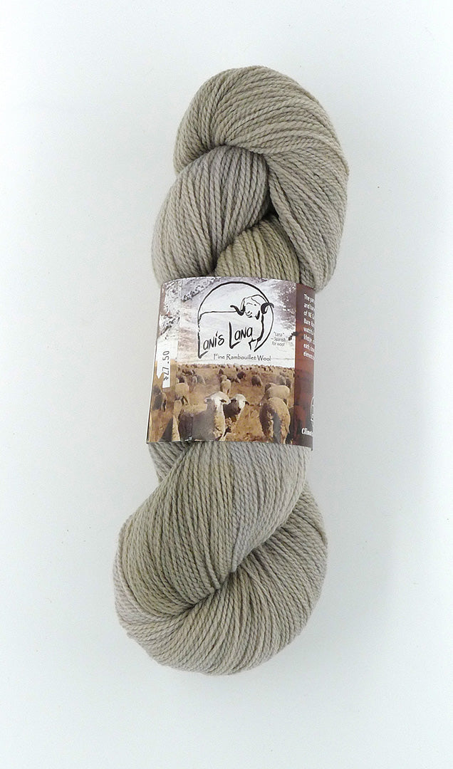 Buffalo Hills "Sand" Botanically Dyed Sport weight yarn on a Climate Beneficial Wool Base Yarn. 4 0z 3-ply skeins made and sourced in the USA. Neutral sandy shade of gray makes a great contrast for color work.