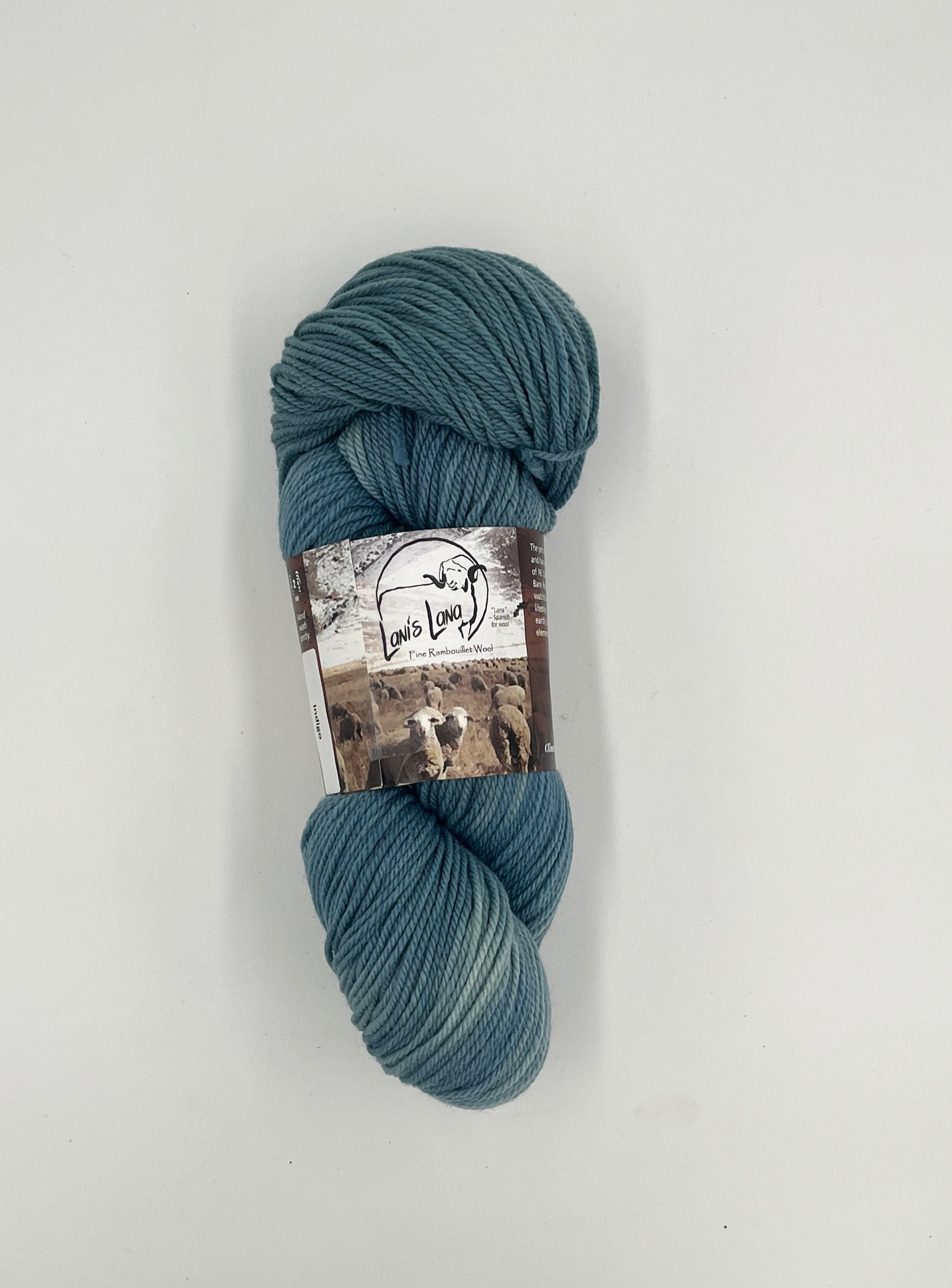 Buffalo Hills "Indigo" Botanically Dyed Sport weight yarn on a Climate Beneficial Wool Base Yarn. 4 0z 3-ply skeins made and sourced in the USA. Semi-solid dyed in house with natural Indigo.
