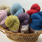 Naturally Dyed Wool Yarn in 9 semi-solid colors.  Climate Beneficial Wool Base Yarn sourced from the Bare Ranch.  Single Ranch, transparent supply chain, all made in the USA.